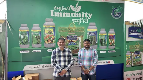 Farmers at the Immunity stall at a farmer fair