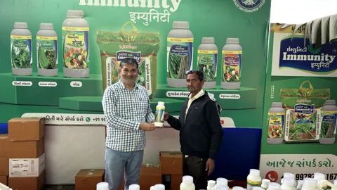 Farmers at the Immunity stall at a farmer fair
